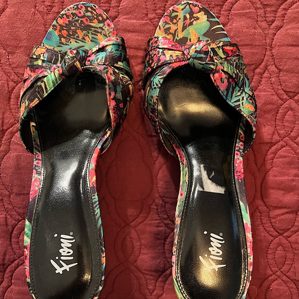 Pair of very cute multi color sandals with small heel!